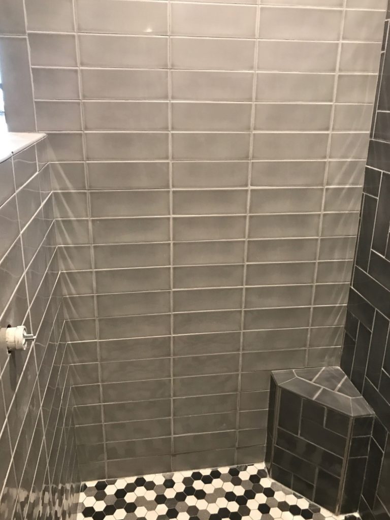 Gray glass stacked shower