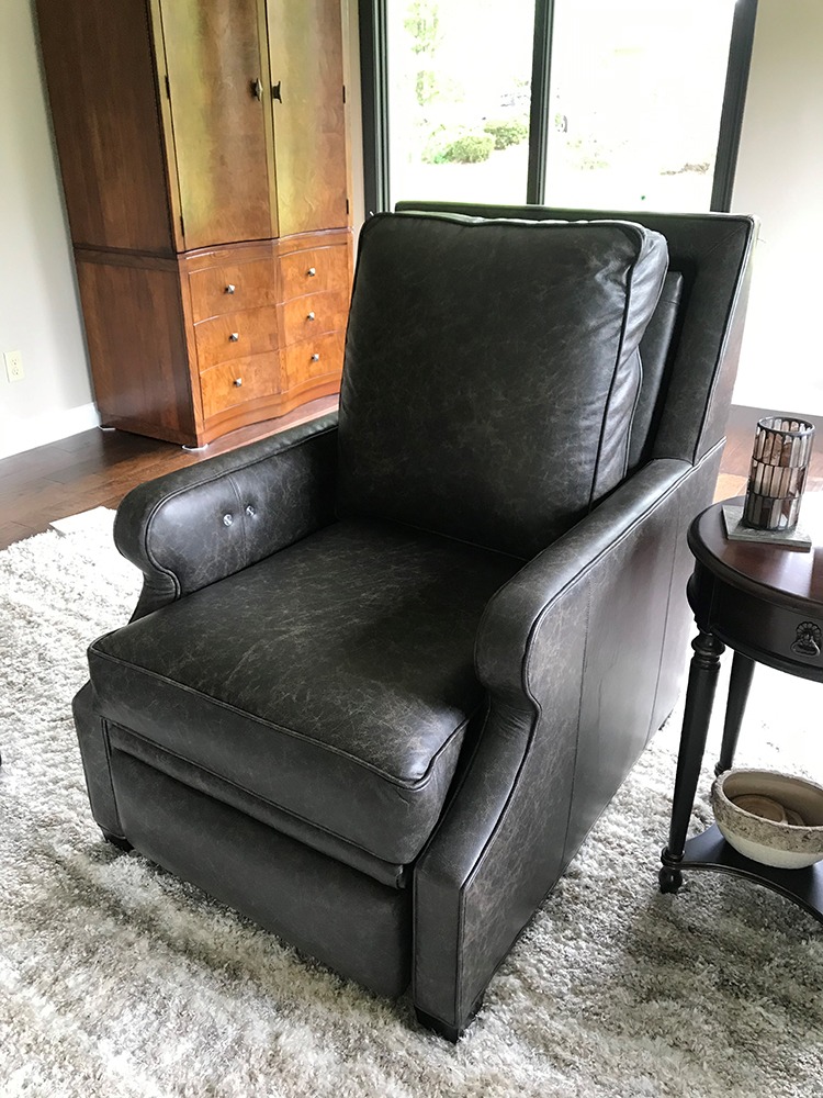 Black distressed leather armchair